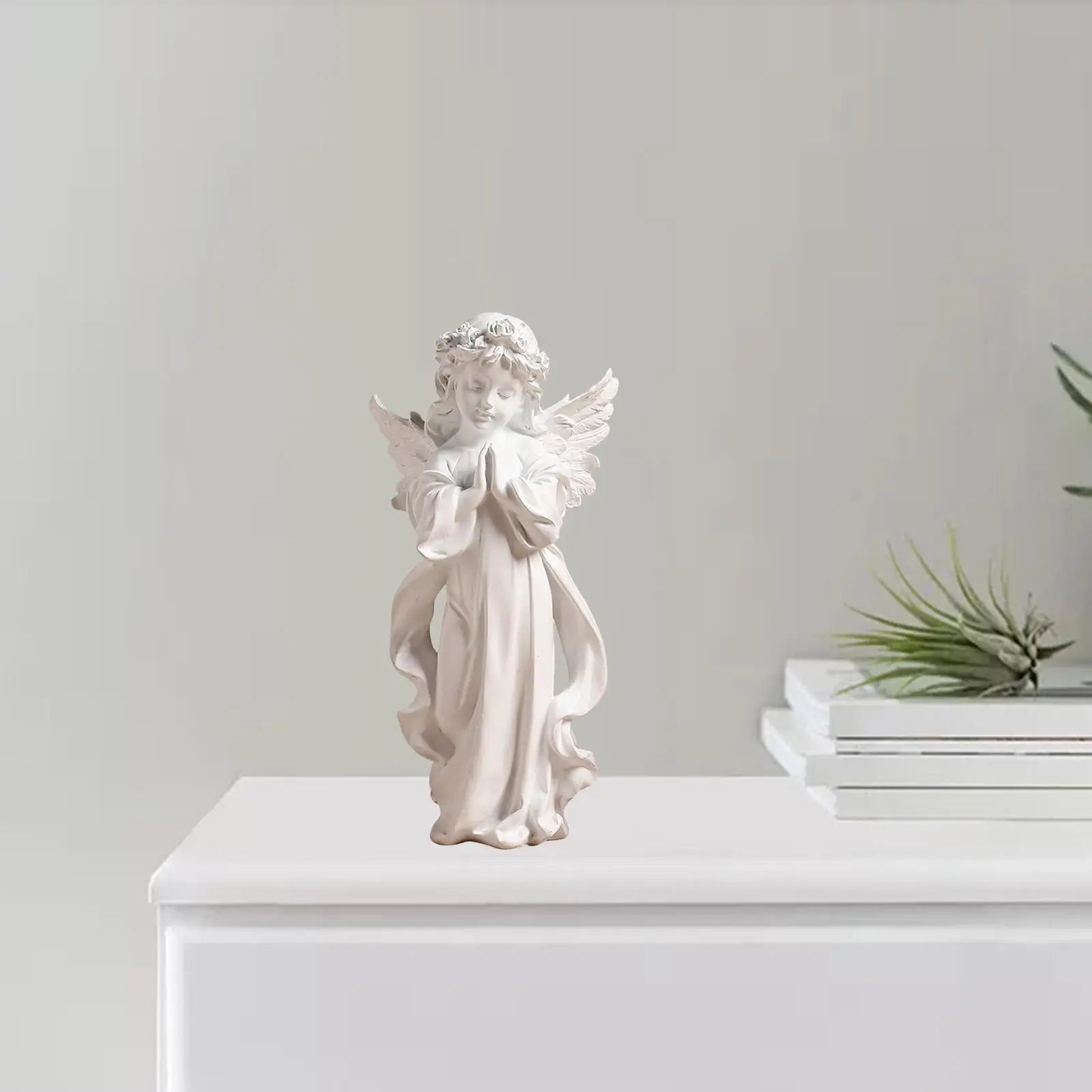 Figurine d’ange en prière en résine