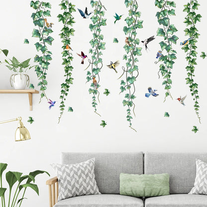 Autocollants muraux plantes vertes, fleurs et papillons posés dans une chambre d’enfant, ambiance naturelle et décorative - Décoration intérieure