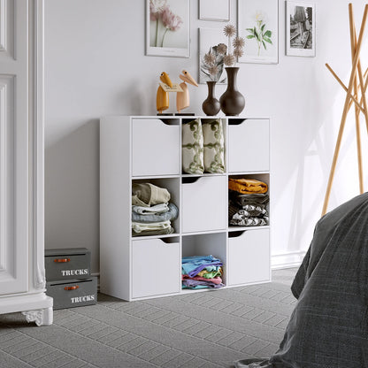 Bibliothèque blanche en bois avec 9 cubes de rangement ouverts, dimensions 90x29x90 cm, idéale pour salon.