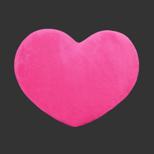 Coussin cœur moelleux utilisé comme décoration de salon