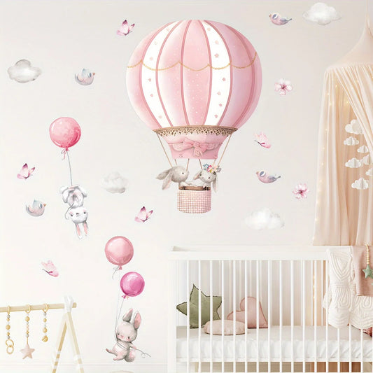 Deux stickers muraux représentant des lapins mignons avec ballons roses et nuages, posés dans une chambre d’enfant au style tendre et pastel - Décoration intérieure