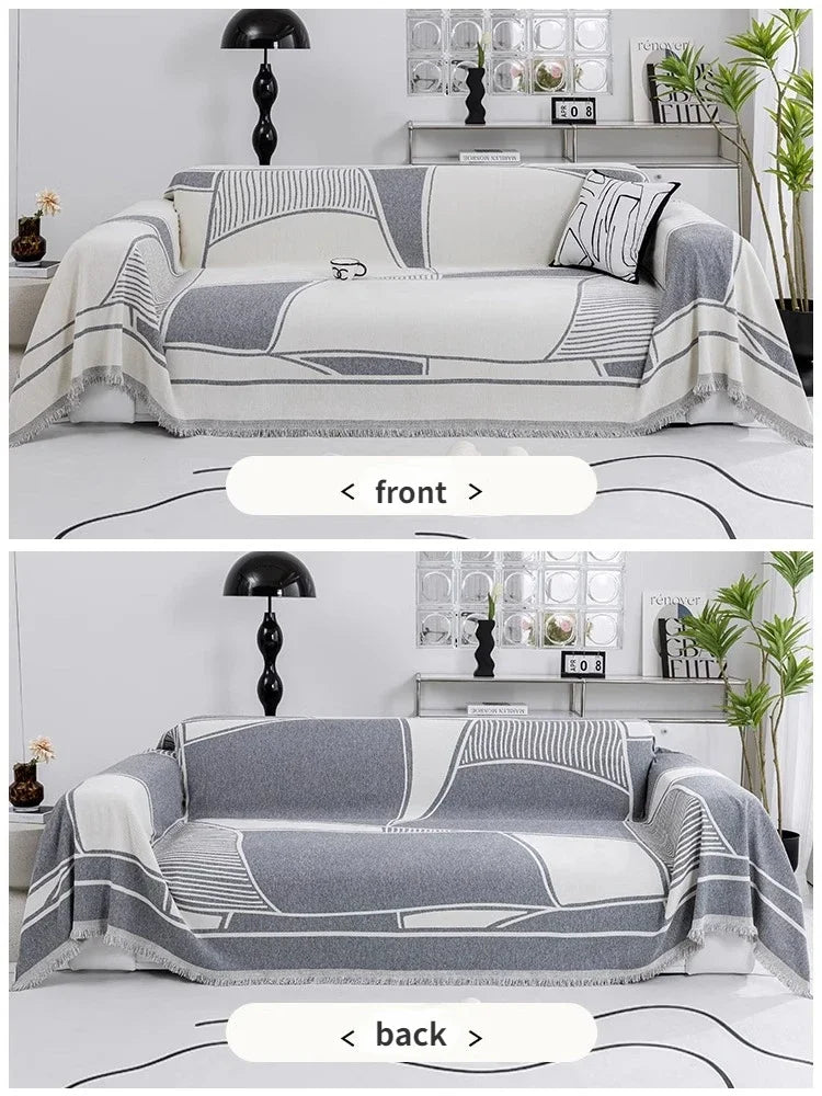 Housse de canapé nordique en coton, posée sur canapé moderne, ambiance cosy et minimaliste. Décoration intérieure