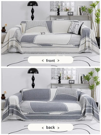 Housse de canapé nordique en coton, posée sur canapé moderne, ambiance cosy et minimaliste. Décoration intérieure