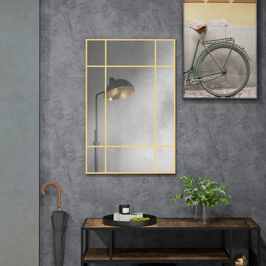 Miroir mural rectangulaire 90 x 60 cm avec cadre doré en métal, accroché dans un intérieur raffiné et lumineux - Décoration intérieure