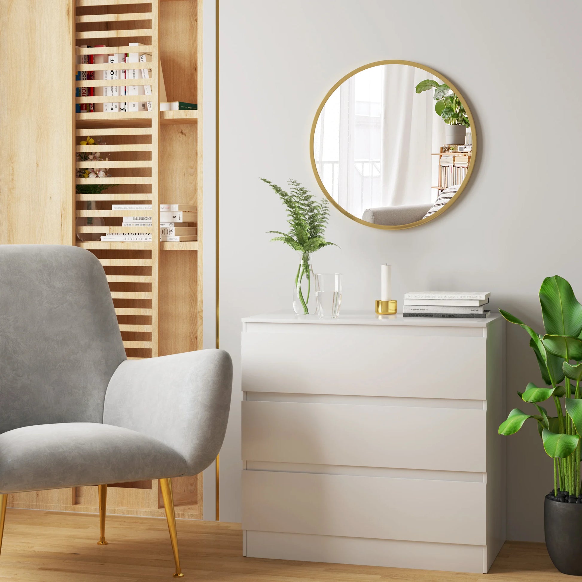 Miroir rond suspendu avec cadre doré moderne accroché dans une chambre lumineuse et décorée avec goût - Décoration intérieure