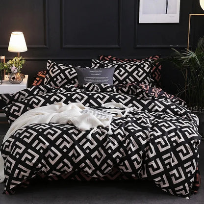 Parure de lit noire de luxe avec housse de couette et taies d’oreiller assorties. Décoration intérieure