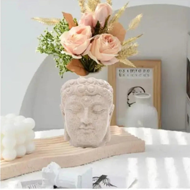 Pot décoratif en forme de tête de Bouddha