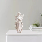 Figurine d’ange en prière en résine
