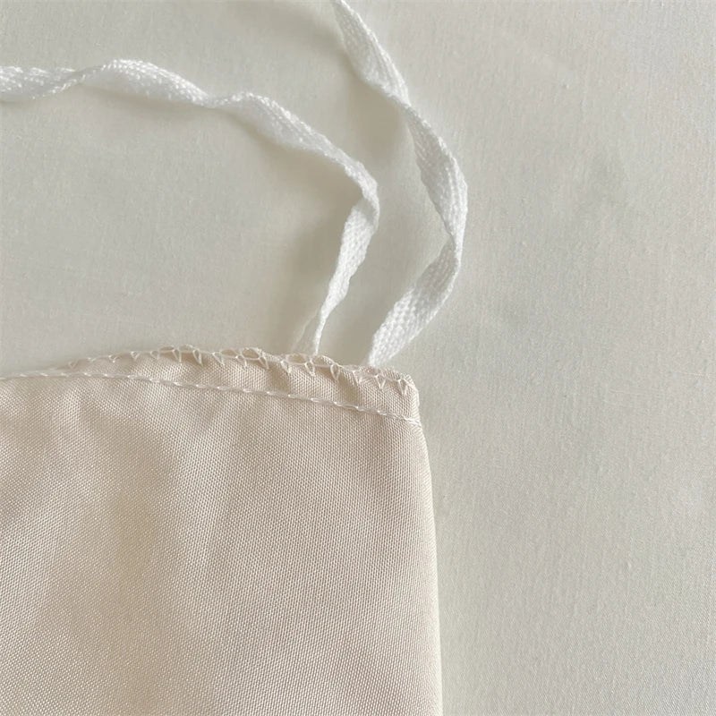 Parure de Lit à Fleurs Torsadées