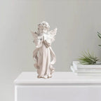 Figurine d’ange en prière en résine